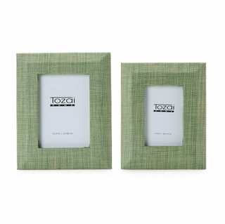 Green faux seagrass photo frame holding a 4 x 6 photo