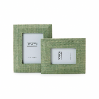 Green faux seagrass picture frame displayed vertically