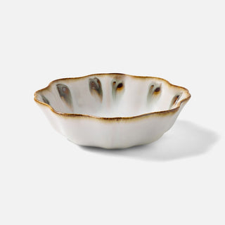 White ceramic bowl with brown accents on a white background