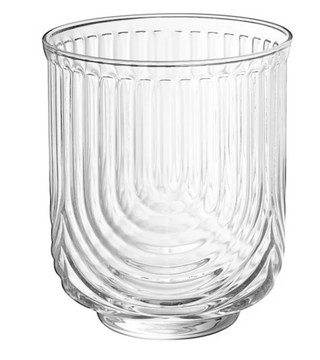 A clear glass with a geometric Art Deco design, suitable for serving cocktails.