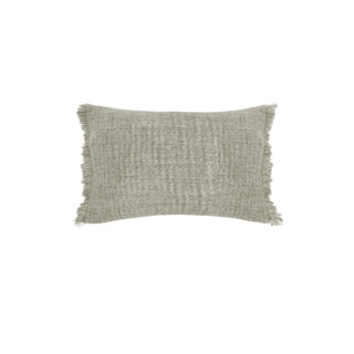 A rectangular throw pillow in a textured, woven bouclé fabric with fringed edges, shown in a light gray color on a solid white background.