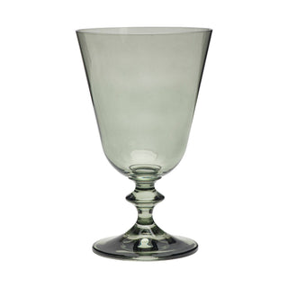 A translucent smoky green glass goblet with a wide flared rim and a flared base, shown on a plain white background.