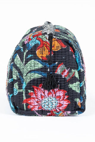 Colorful floral-patterned bag with a black background
