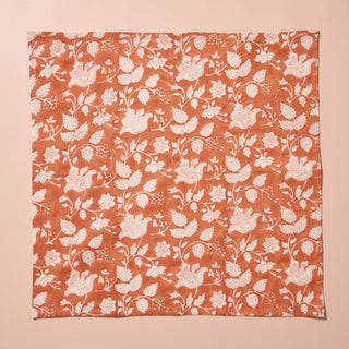 Orange and ivory Indian block print napkin  with floral design