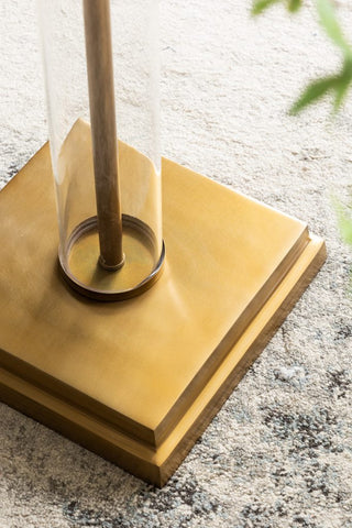 Close up of bronze base to floor lammp