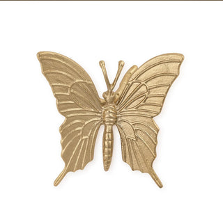Gold butterfly decorative item on a white background
