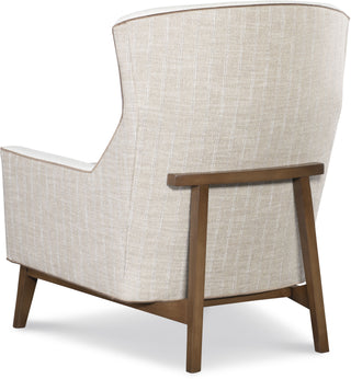 Beige armchair with wooden frame on a white background