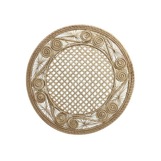 A round, inticately woven placemat made in Columbia from natural fibers
