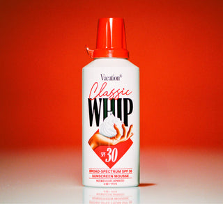 Vacation Classic Whip sunscreen mousse bottle with red cap