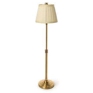 Cordless Gold lamp with a beige shade is adjustable