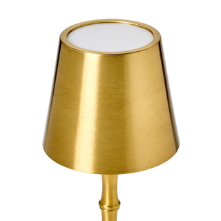 Gold metal lamp shade with three light settings.