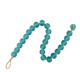 Turquoise beaded garland on a white background