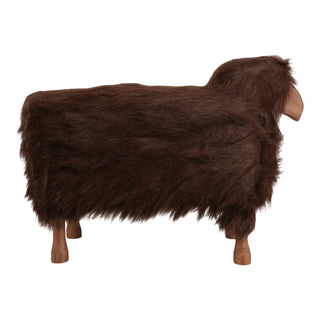 A sheep-shaped bench upholstered in dark brown faux fur, featuring light brown wooden legs and ears, shown from a side profile on a white background.