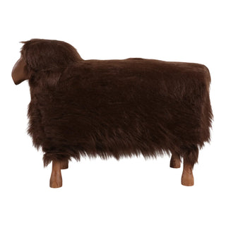 Brown sheep figurine on a white background