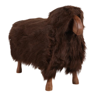 Brown faux fur animal figure on a white background