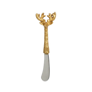 A decorative cheese knife with a gold-toned deer head handle and a silver-colored metal blade, shown against a plain white background.