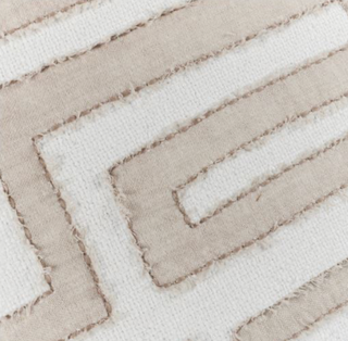 Rough finishing gives texture to this well-constructed Kuba pillow 