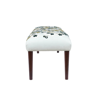 Stool with floral patterned top and wooden legs on a white background