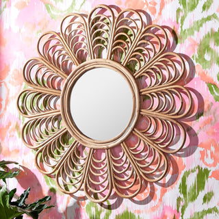This flower shaped mirror made of natural cane complements all home decor