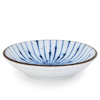 Ceramic soy sauce or condiment dish has modern blue and white pattern