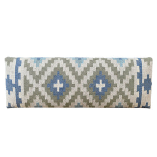 A rectangular throw pillow with a woven geometric pattern in blue, sage green, and cream.