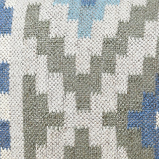 Close-up of a patterned fabric with blue and gray colors.