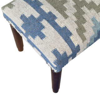 Small ottoman with a geometric pattern on a white background