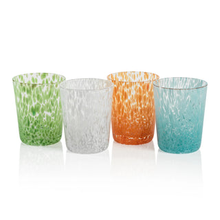 Four colorful glass tumblers on a white background