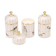 Set of decorative jars with birdcage designs on a white background