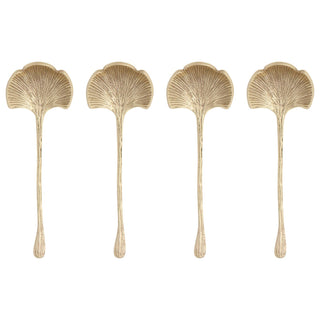 Four gold-finished ginkgo leaf shaped decorative spoons arranged in a row against a plain white background.