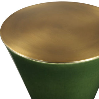 shiny gold top of green drink sidetable