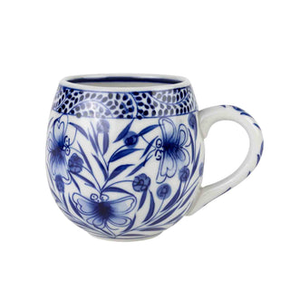 Ceramic mug made in Vietnam with blue floral patterns 