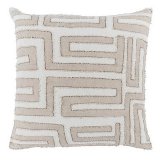 A beige and white geometric patterned throw pillow.