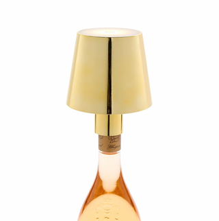 Gold-colored LED bottle lamp on wine bottle