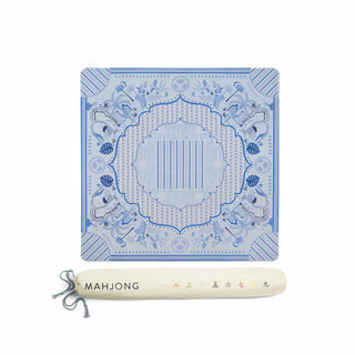 A blue and white patterned Mahjong tile set shown with its cream-colored carrying case on a plain white background. The case features the brand name 'MAHJONG' printed on it.