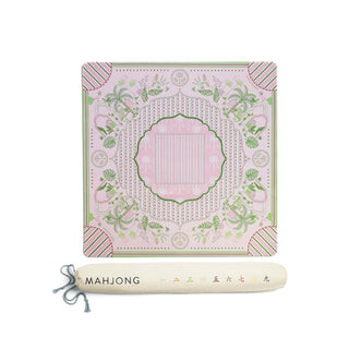 A pink and green patterned mahjong tile set box shown closed, with a cream-colored mahjong rolling case labeled 'MAHJONG' placed in front on a plain white background.