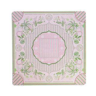 A square decorative placemat with a symmetrical botanical pattern in shades of pink, sage green, and white, set against a plain white background.