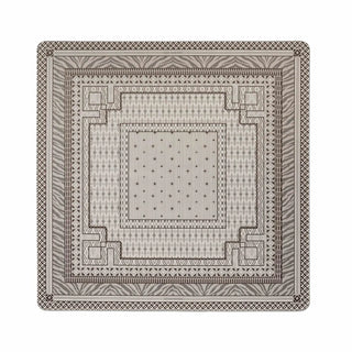 A square decorative mat or rug featuring an intricate geometric and tribal-inspired pattern in black on a light beige background, isolated on a white studio background.