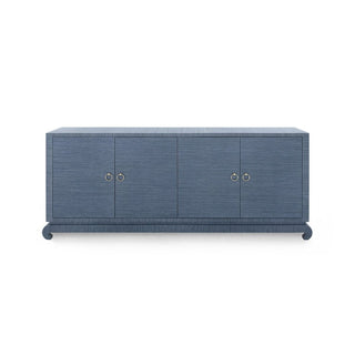 An extra-large Asian inspired 4-door cabinet designed with Chow-style feet and clear lacquered grasscloth.