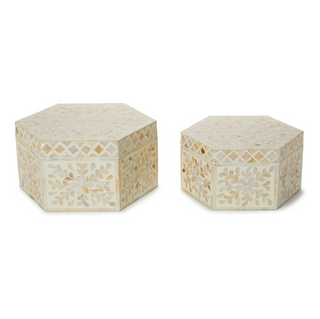 Two hexagonal decorative boxes with mosaic patterns on a white background