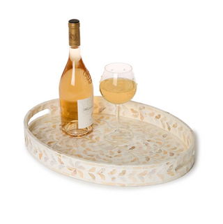 Serve up food and drinks on this global design decorative tray