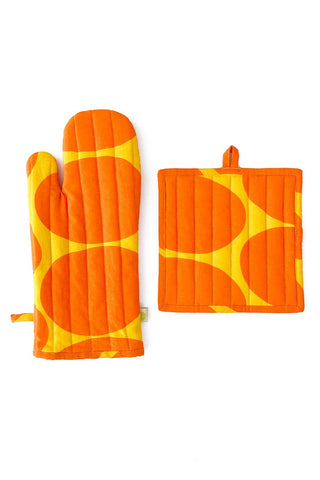 Orange and yellow patterned oven mitt and pot holder protect your hands and kitchen surfaces when cooking