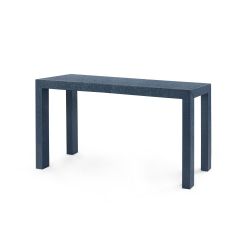 A deep navy Parsons console table with a sleek silhouette and raffia finish
