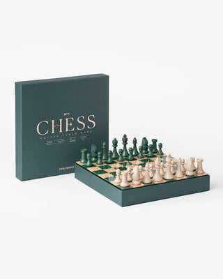 Chess set with pieces and board on a white background