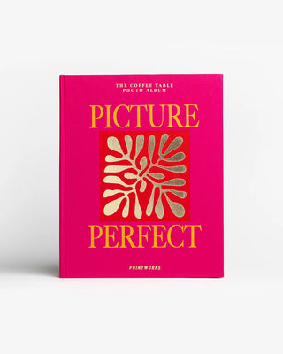 Pink coffee table photo album with 'Picture Perfect' text and design on a white background
