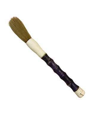 A traditional Chinese calligraphy brush with brown bristles, a cream-colored ferrule, and a dark purple bamboo handle with cream-colored end caps, shown on a plain white background.