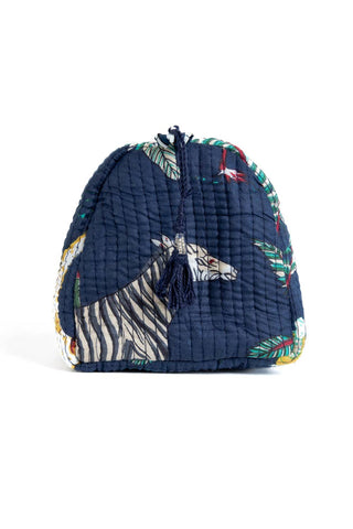 Navy blue quilted bag with zebra pattern on a white background