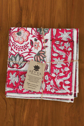 Set of red and white block print floral patterned napkins with border