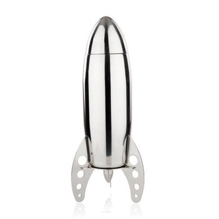A stainless steel cocktail shaker designed to look like a rocket ship, complete with a stand resembling launch pads.