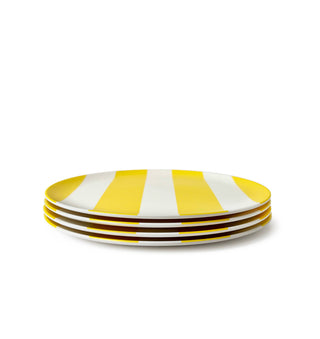 Set of four yellow and white striped plates